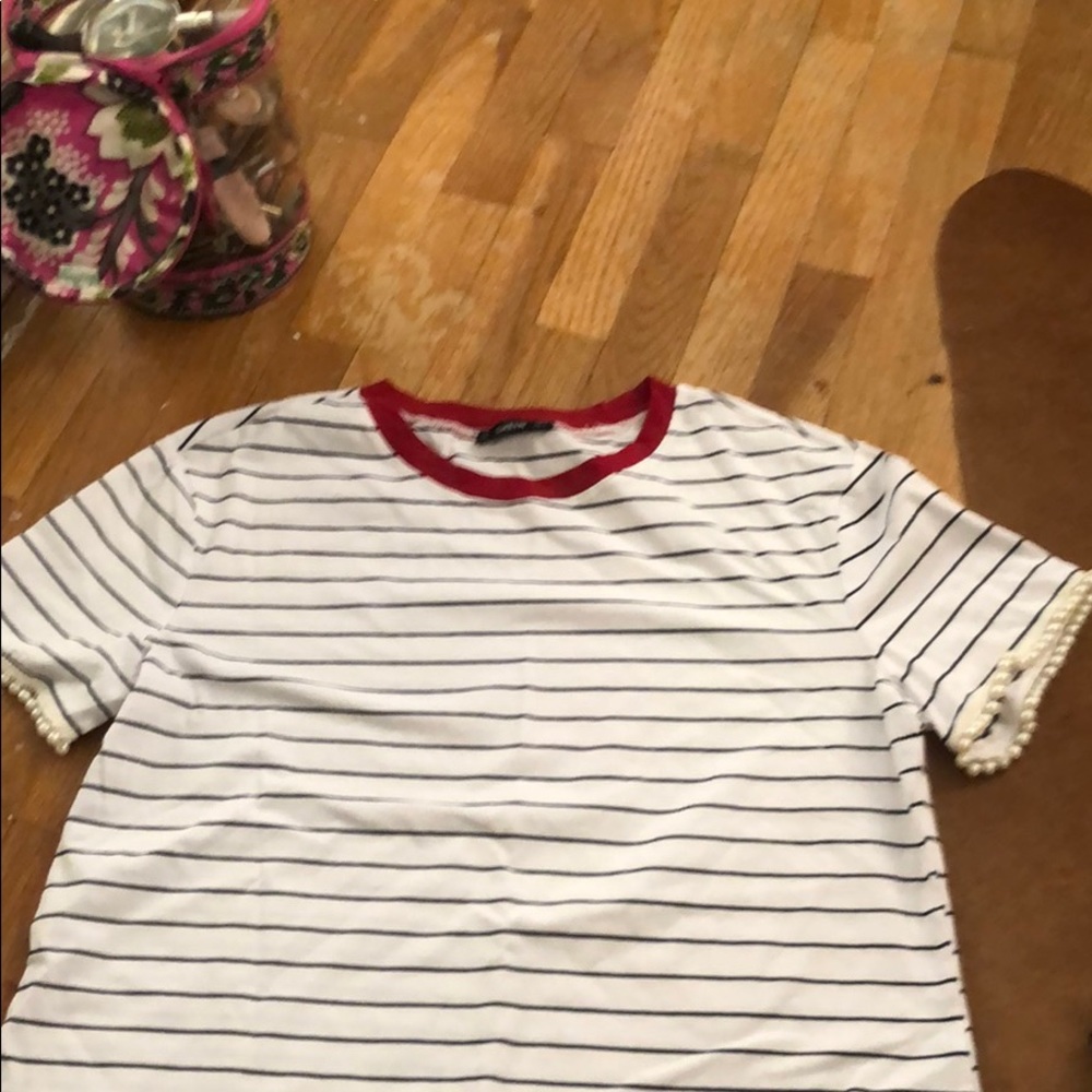 Red, white, and blue shirt with pearl sleeves